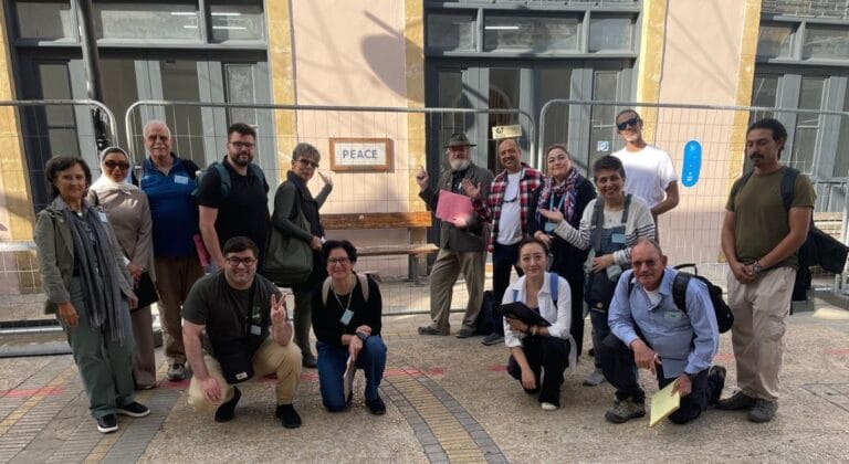 Train the Trainer participants in front of the peace mosaic in Nicosia, Cyprus