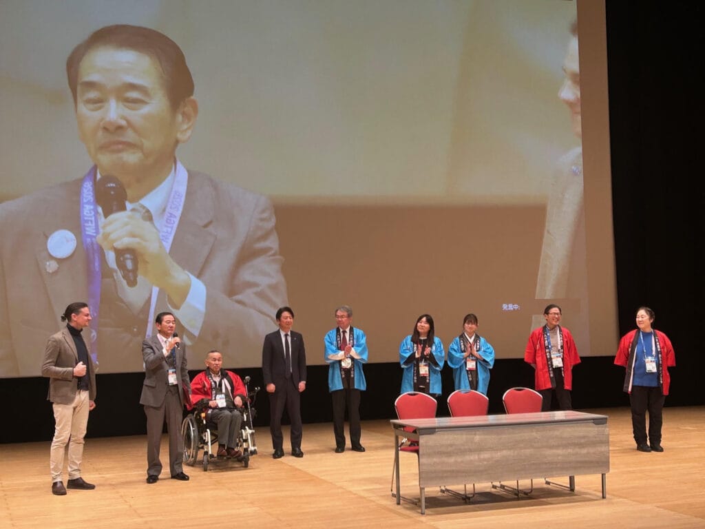 Speakers on stage at the closing ceremony of the 2026 Convention in Fukuoka